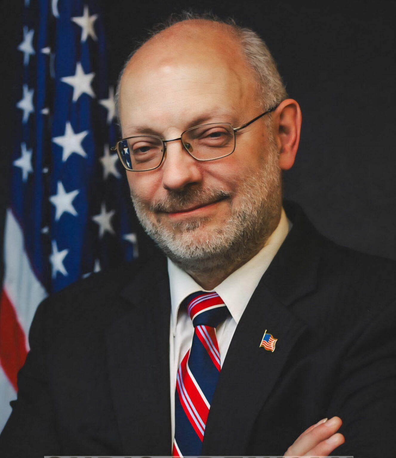 Gregg Mele wearing a suit